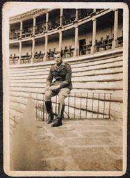 Photograph of James Roche seated at bullring in Cáceres