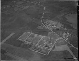 Aerial - Factory site and houses