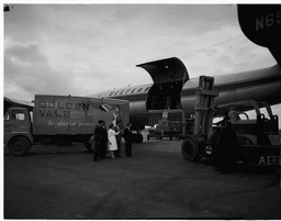 Loading up Golden Vale cheese on a Seaboard & Western Air plane