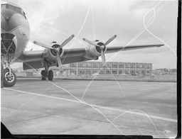 Plane at east hangar and Progress International Factory area