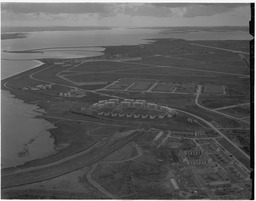 Aerial - Industrial estate and flats