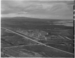 Aerial - Industrial estate and flats