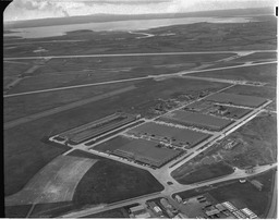 Aerial - Industrial estate and flats