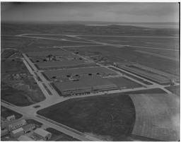 Aerial - Industrial estate and flats