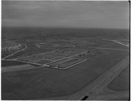 Aerial - Industrial estate and flats