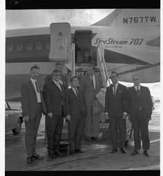 Mr Pishner and group at Trans World Airlines (TWA) plane