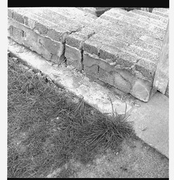 Damaged wall in housing estate, Shannon