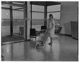 Cleaning airport concourse