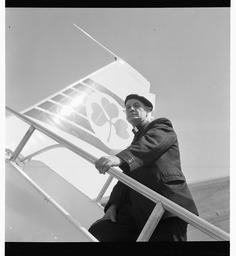 Father Aengus Buckley on steps of Aer Lingus plane