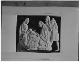 M. Harnett and crib from nativity scene