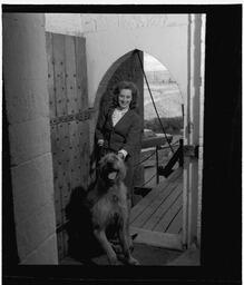Tour guides with wolfhound in main hall