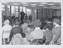 Bishop Newman addressing student body October 1974