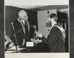 Paul Quigley presents distinguished performance gold medal to John Francis Griffin