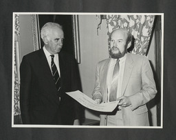 Paul Quigley presenting awards for Excellence in Teaching to Dr Stuart Hampshire and to Anthony Leddin