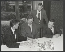 John O'Connor, Michael Smith TD, Noel Whelan and Peter James looking at the [campus development plan?]