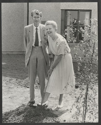 John O'Connor and Mirette Corboy planting a tree at a handing over ceremony of Plassey Student Village