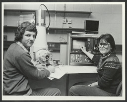 Students in a science laboratory [mechanical engineering?]