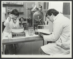 Students in a science laboratory [mechanical engineering?]