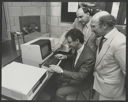 Sean Maloney demonstrating the capabilities of the Intel MAP network to Pat O'Leary and Professor Thomas Coffey