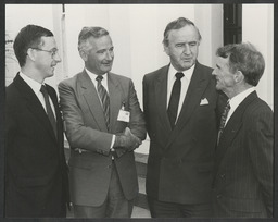 Professor Noel Whelan and Albert Reynolds, TD, with two other men outside Plassey House