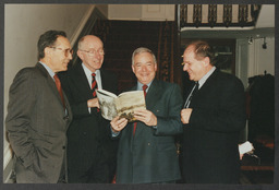 Humanities Presentation, Marc Serge Rivière book launch, "The Governor's Noble Guest," Group Portraits taken outside Plassey House, a man and a woman in Plassey House, two men looking at a book titled "American Institute for Foreign Study 1999-2000"