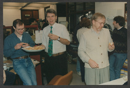 AV unit activities including Christmas party 1995, event in Glucksman Library, computer and lab equipment, staff portraits, Stables courtyard