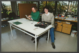 AV unit activities including Christmas party 1995, event in Glucksman Library, computer and lab equipment, staff portraits, Stables courtyard