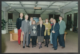 AV unit activities including Christmas party 1995, event in Glucksman Library, computer and lab equipment, staff portraits, Stables courtyard