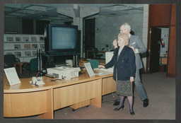 AV unit activities including Christmas party 1995, event in Glucksman Library, computer and lab equipment, staff portraits, Stables courtyard