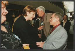 Shots of dignitaries on UL campus including Mary McAleese, an event featuring P. Leo Colgan, opening of a Gordon Lambert collection by Dr Ed Walsh in 1997