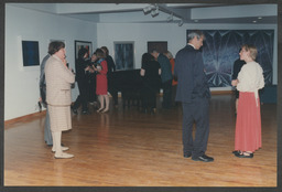 Shots of dignitaries on UL campus including Mary McAleese, an event featuring P. Leo Colgan, opening of a Gordon Lambert collection by Dr Ed Walsh in 1997