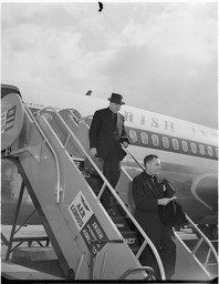 Father Peyton and Dr. Prigio, C.S.C. disembarking