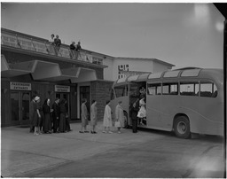 Bus tour loading on ramp