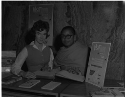 Buddhist Monk signs book for Roísín Caughlan