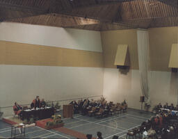 [Liam Dugdale addressing audience at the TCE graduation ceremony.]