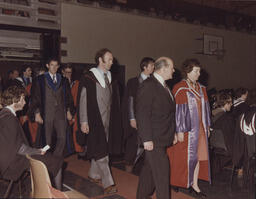 [Procession at TCE graduation ceremony.]