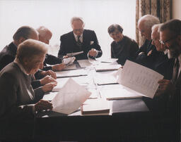 Members of the Planning Board meeting for the 25th anniversary commemoration