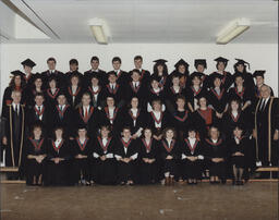 [Group portrait of the graduating class who were awarded Bachelor of Arts in Physical Education degrees.]