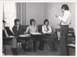 Lecturer Peter Wolk with four students in Plassey House