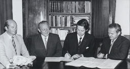 Signing of contract for construction of Phase 1A Buildings September 1973