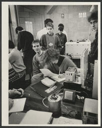 [Electronics?] students at work in laboratories