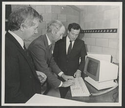 Presentation of Wang Computer to NIHE Limerick, with Bill Hennebry, Dr Ed Walsh, and Ken Bond