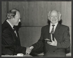 John A. Daly making a presentation to Michael D. Higgins