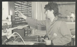 Gary Casey Electronic Engineering student engaged in fault-finding of burning monitoring printed circuit boards at Unitrode BV