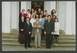 Shots of students on campus and [staff?] in front of Plassey House labelled "Fionnuala Wange group - international women's studies" and "Architects Glucksman Ind.Bio Chem."