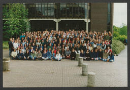 Shots of students on campus and [staff?] in front of Plassey House labelled "Fionnula Wange group - international women's studies" and "Architects Glucksman Ind.Bio Chem."