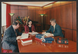 Group shots of legal professionals with wigs/cloaks, Individual and group shots in office and other settings - labelled "Dermot Walsh Law Brochure"