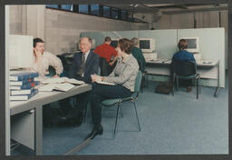 Group shots of legal professionals with wigs/cloaks, Individual and group shots in office and other settings - labelled "Dermot Walsh Law Brochure"