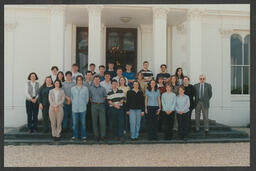 Group shot of students with staff in front of Plassey House labelled "Law & Accounting 97"