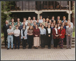 Group shot of students with staff on campus labelled "Law"